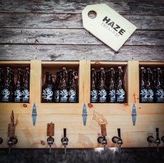 The growler fill bar at Tree House Brewing serving Haze Double IPA
